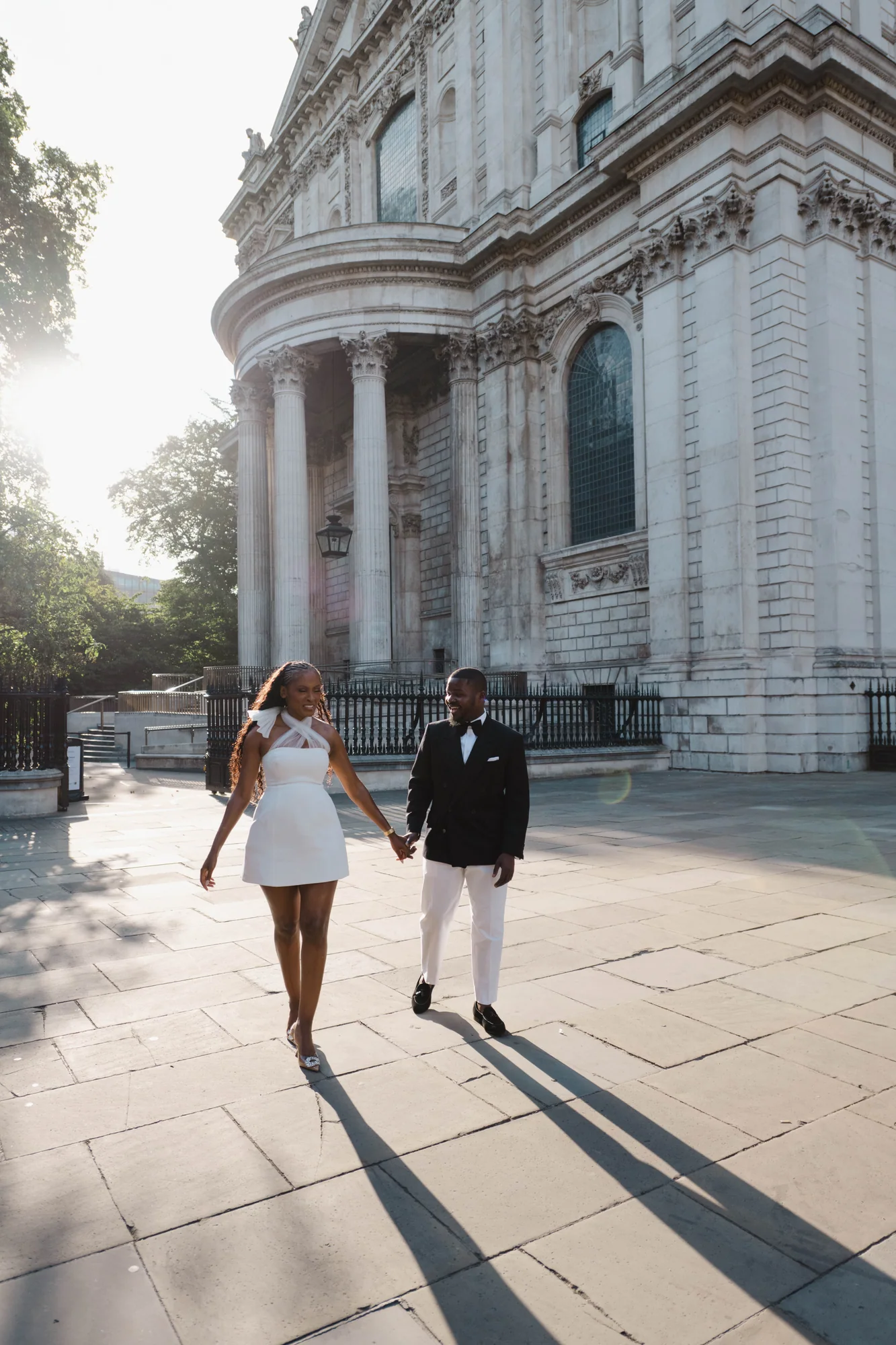 Kennedy and Didimalang walking together outside St Paul's Cathedral