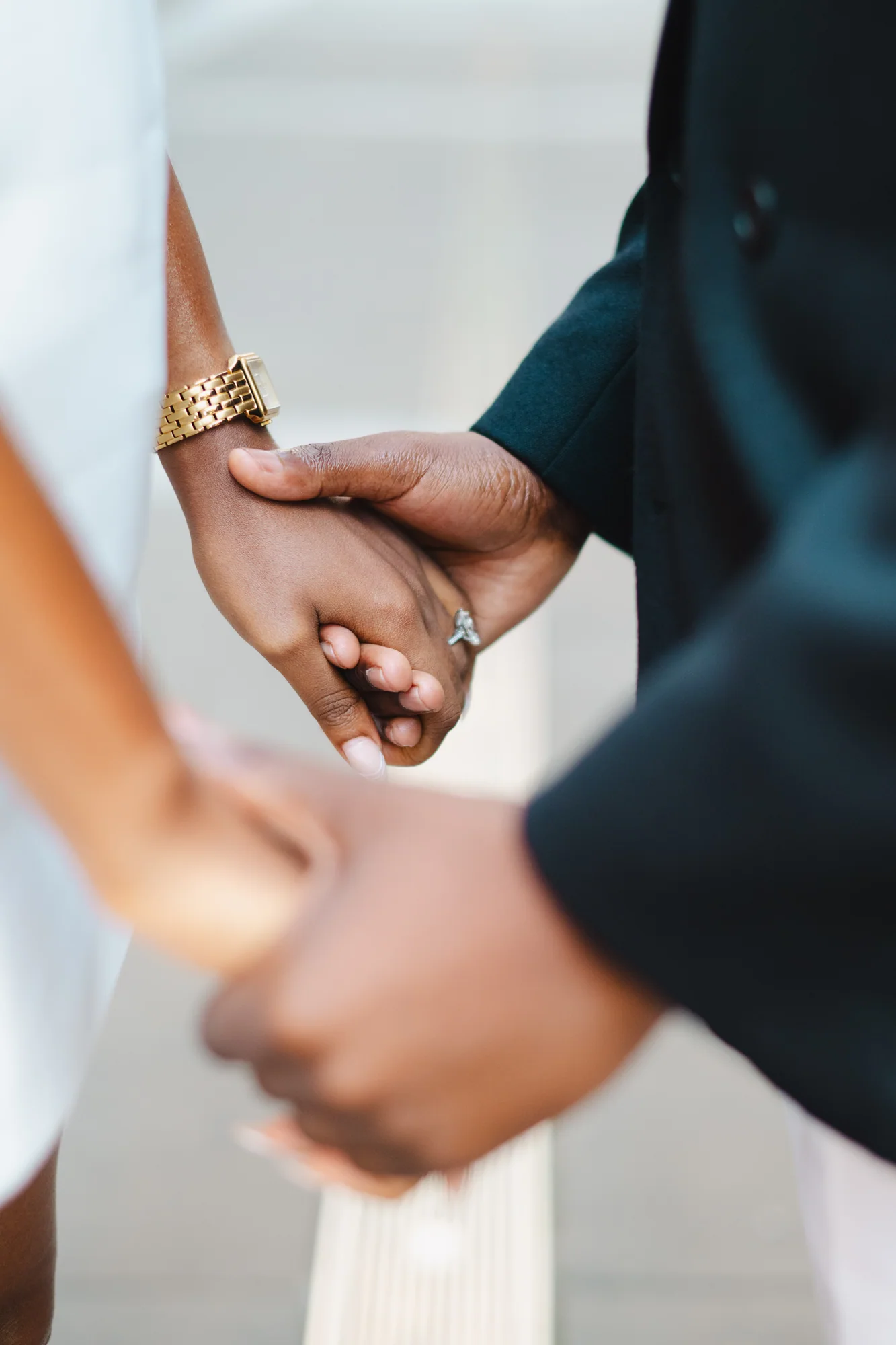 Kennedy and Didimalang holding hands