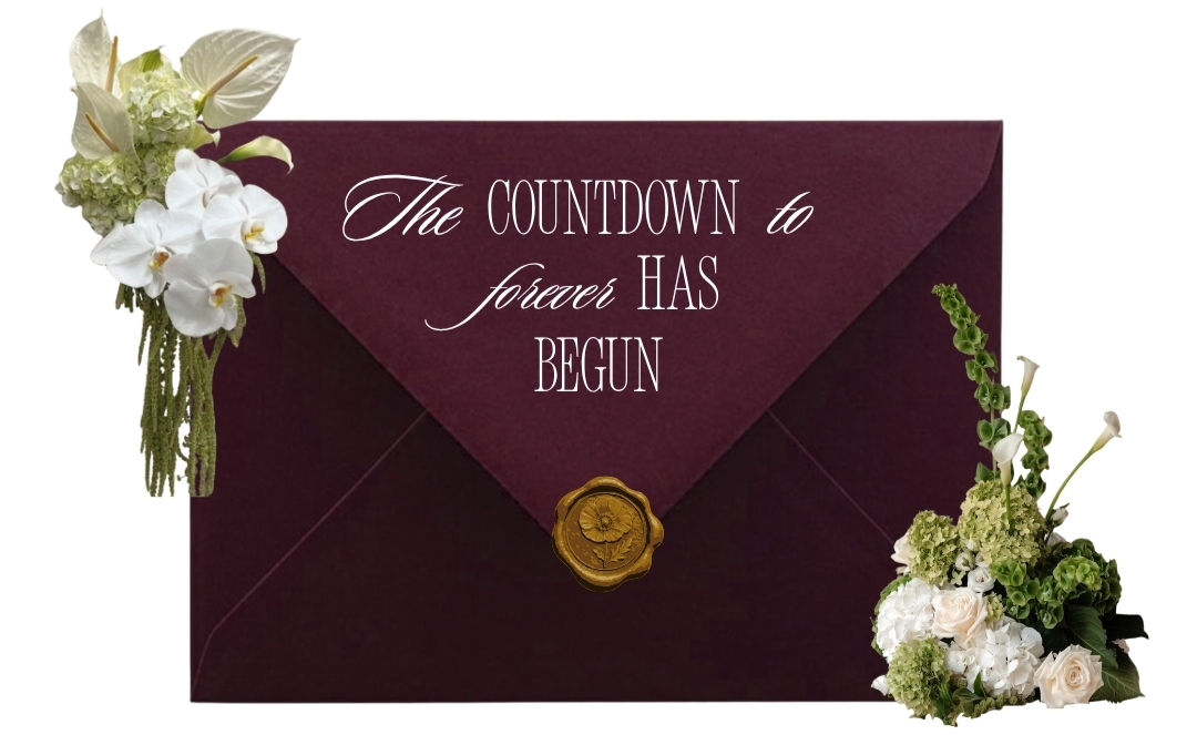 The countdown to forever has begun — a burgundy envelope with white flowers
